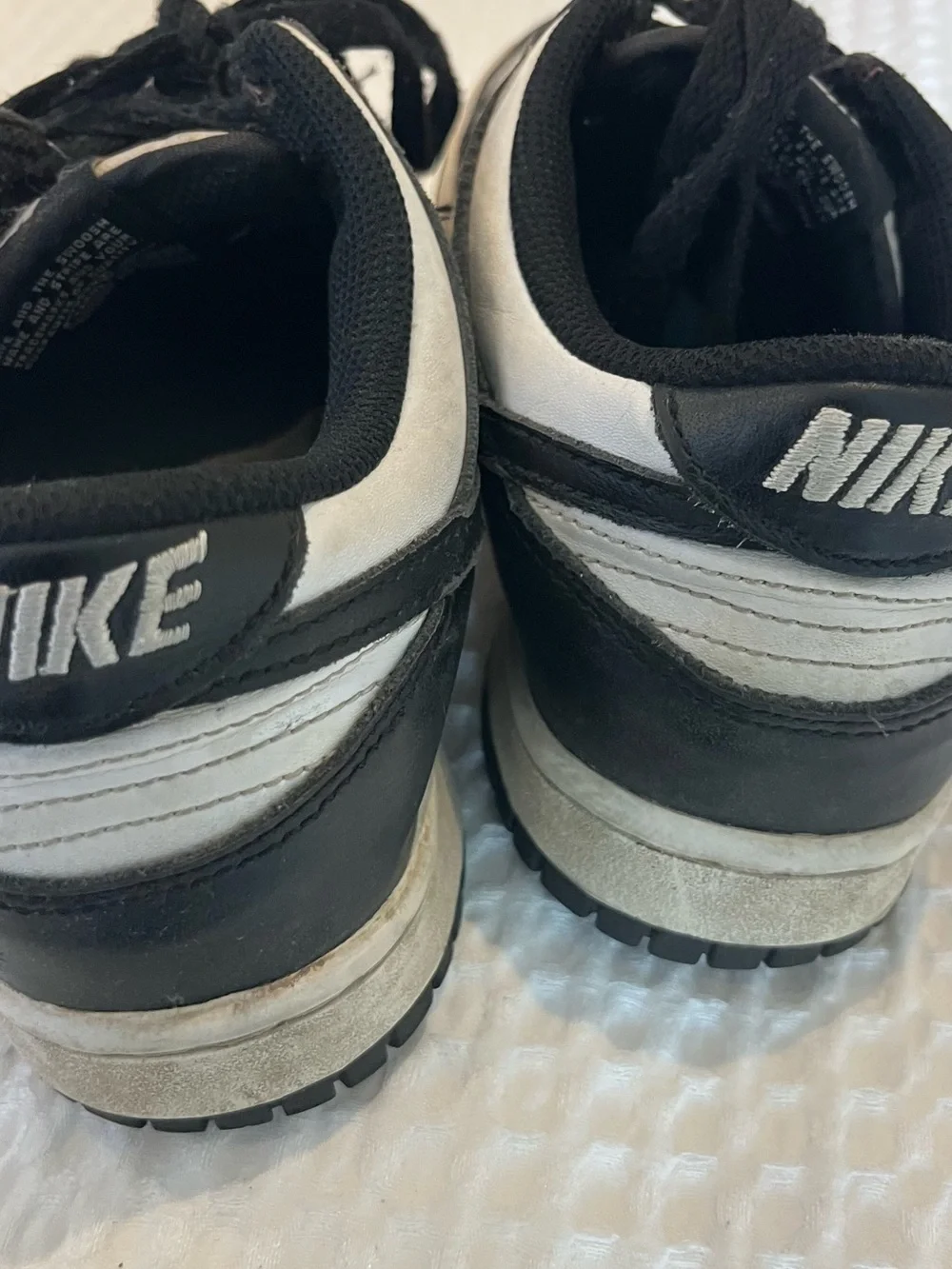 Nike Kids Black and White Low-Top Sneakers with Swoosh